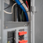 Electrical Distribution Panel with Breaker Lockouts