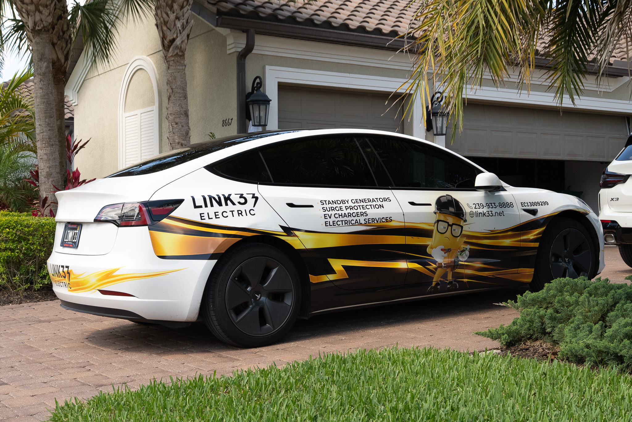 Electric vehicle parked in a residential community highlighting the growing need for multifamily EV charging infrastructure in Southwest Florida.